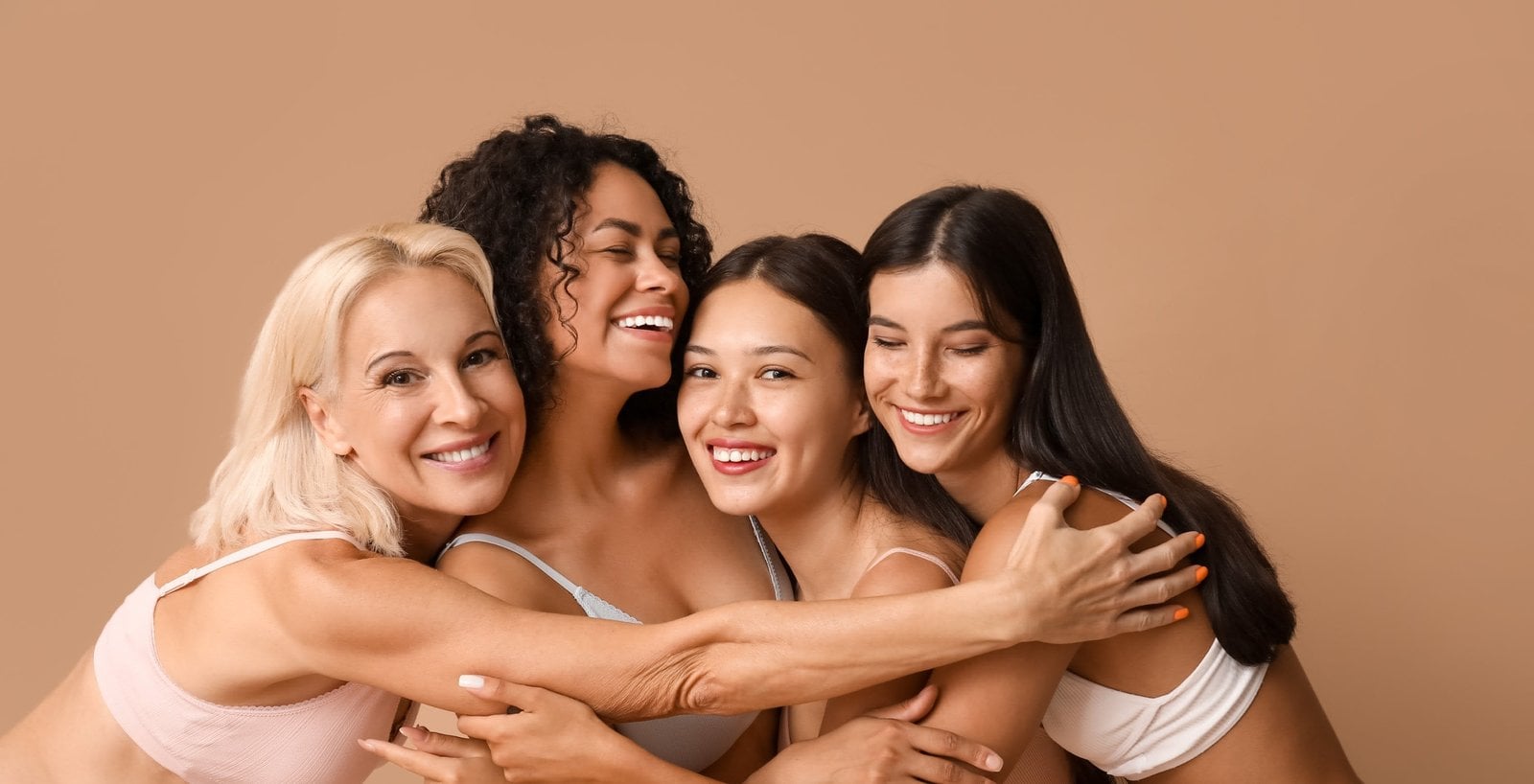 Women of different ages and skin tones together