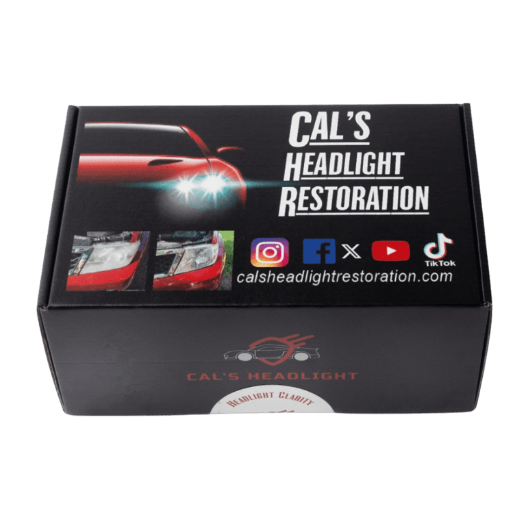 Black product box for headlight restoration service with branding and social icons.