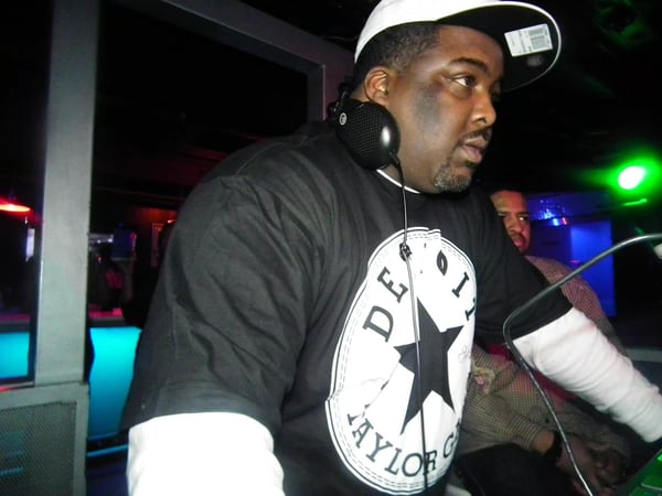 Elite Vendors DJ wearing a Detroit shirt at his event equipment